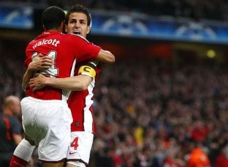 Cesc Hugs Theo As Tight  As He Can