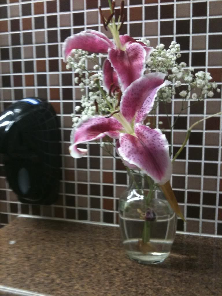 Florida Turnpike Pompano, Bathroom custodians place fresh flowers in vases next to each sink.