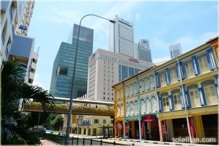  Singapore Pictures on Colourful Shophouses Against A Backdrop Of Office Buildings Somewhere